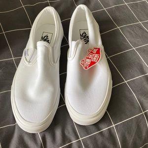 Vans White slip ons size 9.5 men 11 women